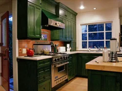 Green kitchen with blue photo