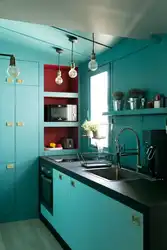 Green kitchen with blue photo