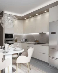 Interior of a corner kitchen in a modern style in light colors