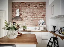 Wallpaper brick in the kitchen photo in the interior