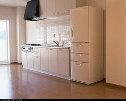 Kitchen design with beige refrigerator