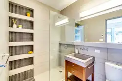 Tile shelves in the bathroom in the wall photo