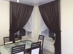 Interior of curtains in the kitchen with two windows