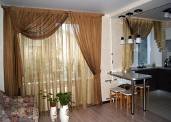 Interior of curtains in the kitchen with two windows