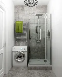 Bathroom interior with shower and toilet, washing machine