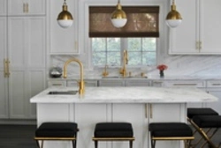 White Kitchen With Gold In The Interior