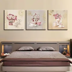 What kind of paintings hang in the bedroom photo