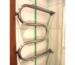 Photo of stainless steel bathroom heated towel rails