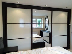 Photo of built-in wardrobes in the bedroom with mirrors