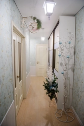 Apartment renovation corridor of a panel house with photo