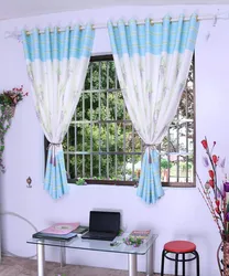 Short curtains for the bedroom up to the windowsill in a modern style photo