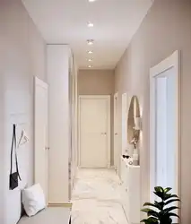 Design of a corridor in an apartment in a modern style photo in light
