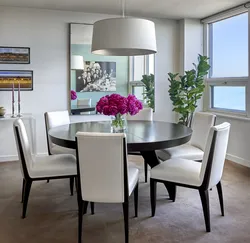 Round table in the interior of a small kitchen