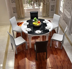 Round table in the interior of a small kitchen