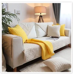 Blanket on the sofa in the living room interior photo