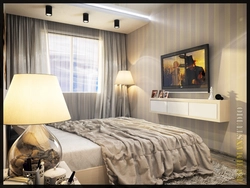 Small bedroom interior with TV