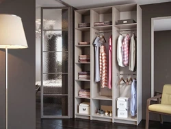 Spacious wardrobe in the bedroom with photo