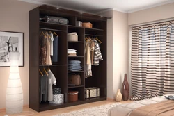 Spacious wardrobe in the bedroom with photo