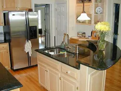 Kitchen island in a small kitchen photo