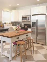 Kitchen island in a small kitchen photo