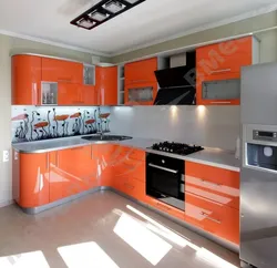 Orange kitchen set in the kitchen interior