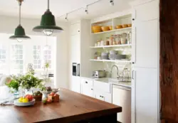 Lamps in a small kitchen interior photo