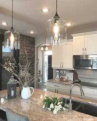 Lamps in a small kitchen interior photo