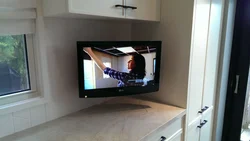 Photo of TV in the kitchen on the table