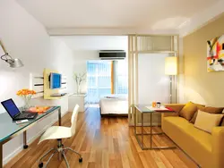 Design of a 30 sq. m one-room apartment with a balcony