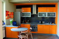 Orange kitchen in the interior with what color