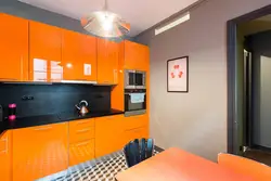 Orange kitchen in the interior with what color