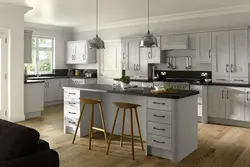 Kitchen design in gray tones with wood