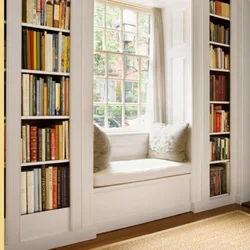 Cabinets by the window in the living room interior