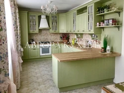 Olive wallpaper in the kitchen interior