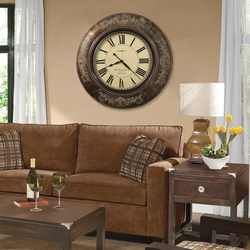 Large wall clock in the living room in the interior photo