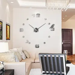 Large wall clock in the living room in the interior photo