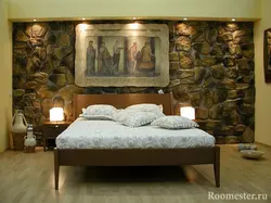 Bedroom interior with stone on the wall