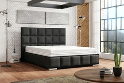 Photo of two double beds