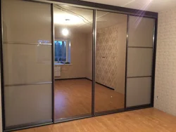 Photo Of A Wardrobe In The Bedroom With A Mirror For Three Doors