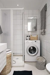 Photo bathroom with shower, washing machine