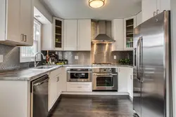 Beige Household Appliances In The Kitchen Interior