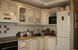 Beige household appliances in the kitchen interior