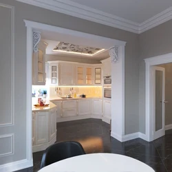 Kitchen with an arch to the living room in the apartment photo