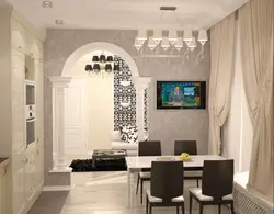 Kitchen with an arch to the living room in the apartment photo