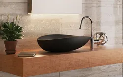 Black sink in the bathroom interior