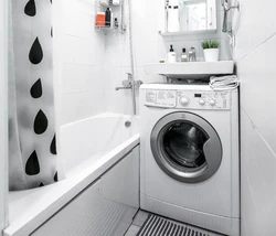 Design of a small bathroom with a washing machine and toilet photo