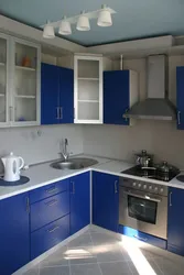 Blue corner kitchen design photo