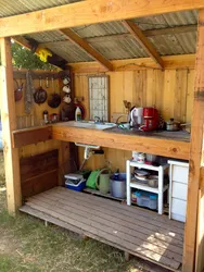 Summer kitchen in the village photo