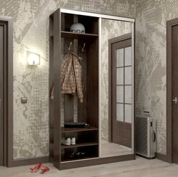 Wardrobe in the hallway with a shoe rack in a modern style photo