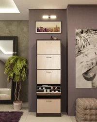 Wardrobe in the hallway with a shoe rack in a modern style photo